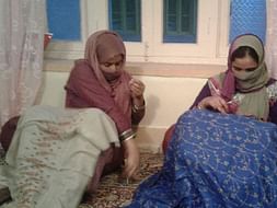 Helping kashmiri women artisans for attending International Trade Fair
