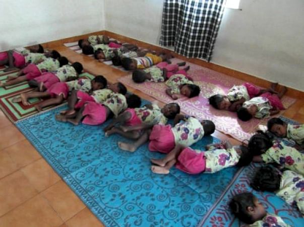 Gift beds,books & bags to our Hostel Children