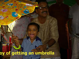 Free Distribution of Umbrella to slum dweller school children - 2017