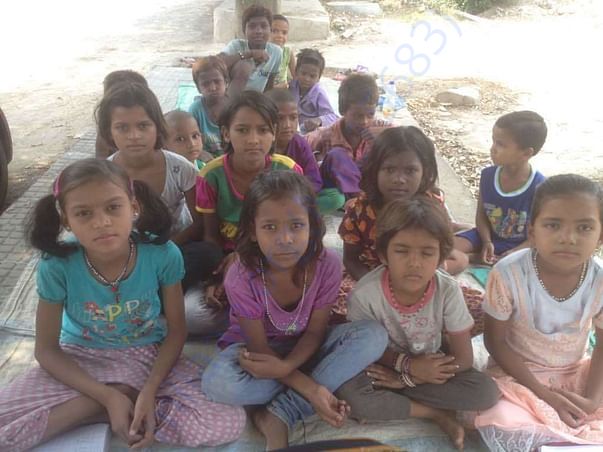 One group of children studying Under The Tree