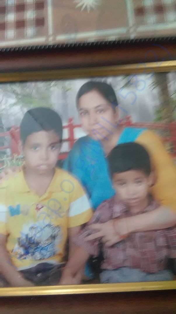 Baby Mihir with his mother and elder brother