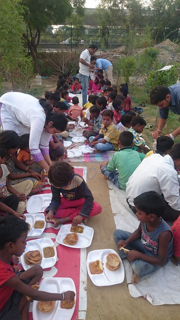 team providing food to our students