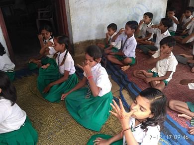 little school kids doing pranayam in yoga camp conducted by me