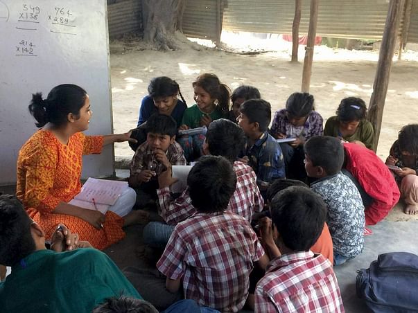 Support Education of Slum Children and Fund Libraries