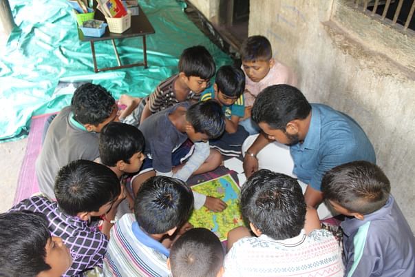 With children at community...