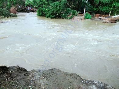 Flow of water inside the village by destroying houses