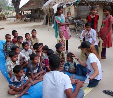 With the Village
