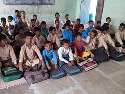 Help Government schools set up libraries and teachers build capacity