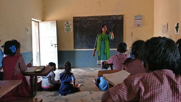 Roshni miss enacting out an English lesson to help students understand