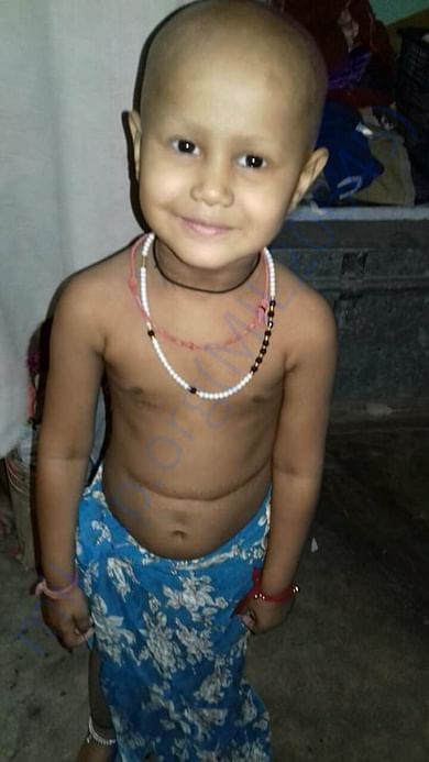 Little girl smiling in this painful time too