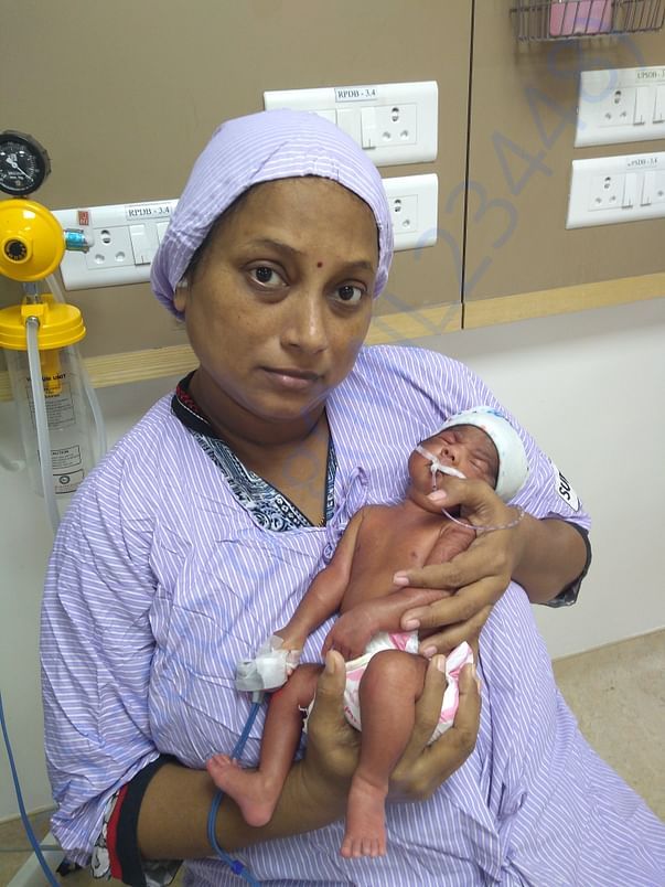 Baby with mother photo