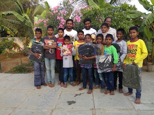 Additionally donating school bags at happy homes.