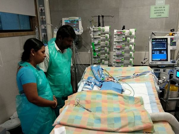 Kalimuthu's baby was born with a heart disease and is now in the ICU