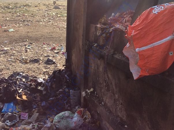 Overloaded trash containers in almost every street
