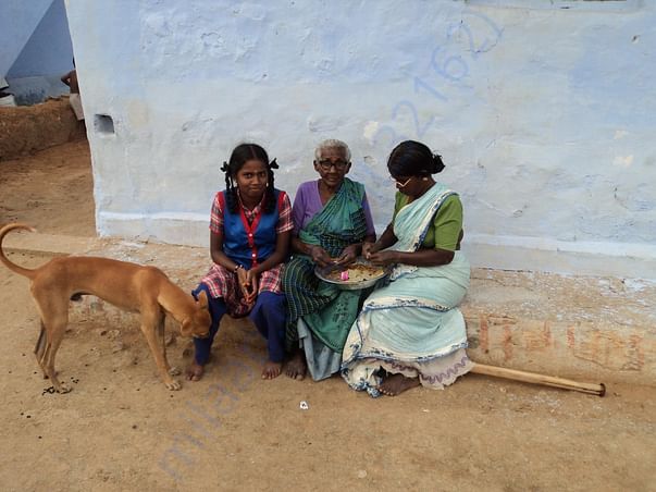 Kowsalya assisting her mother and grandmother in Beedi rolling