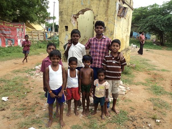 Student hanging out with his friends in the village