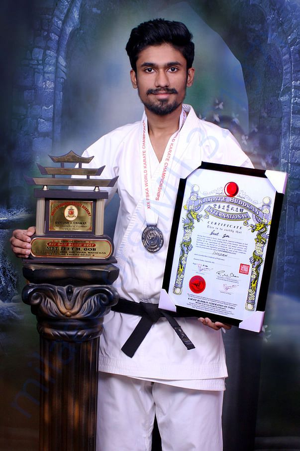 ME with my London medal and 1st Dan Black Belt Certificate and Trophy.