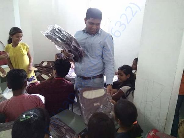 Pay Back To Society (Distribution of School Bags Among Children's)