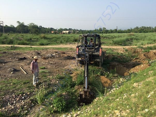 Got a JCB machine to dig the pits in rocky land