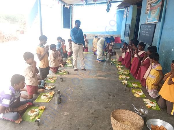CHILDREN HAVING FOOD