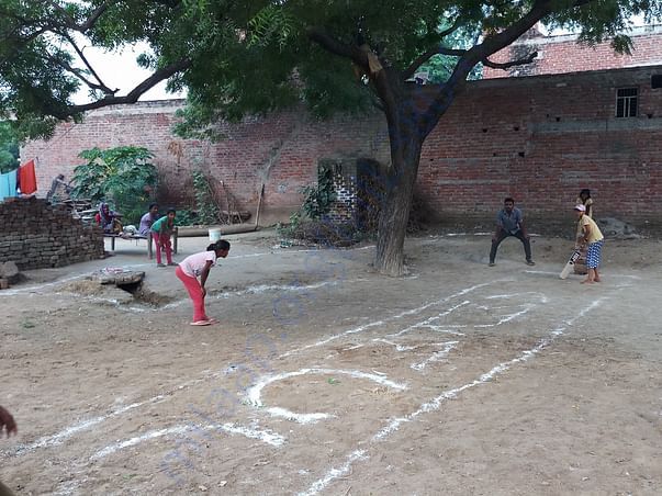Girls practicing and learning Cricket