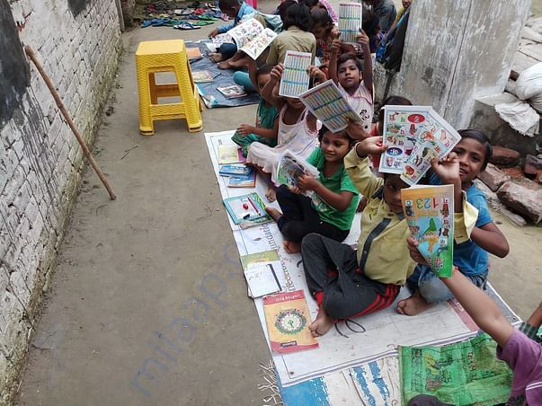 Children showing books