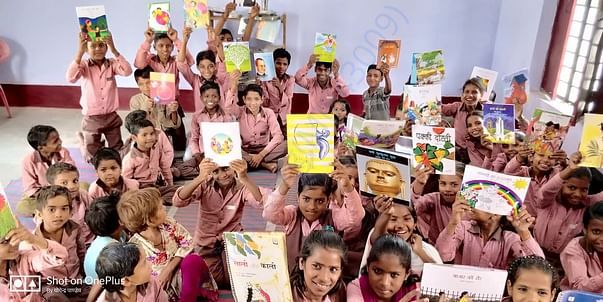 Kids happy getting a library