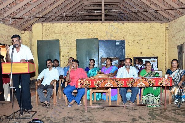 School management addressing the students and their parents