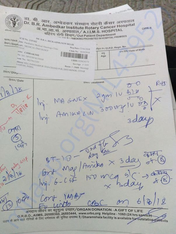 A slip of prescribed medicines, along with her UHID slip