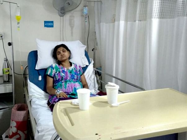 Khantesh is struggling save his sick wife who has lung cancer.
