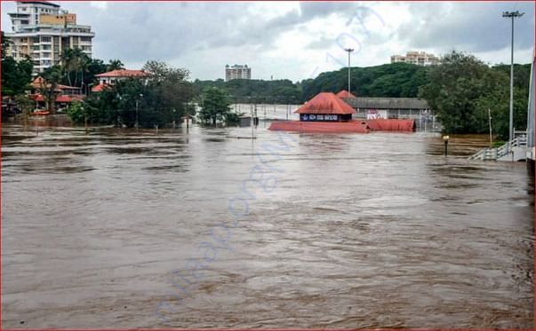 Aluva Mahadeva Temple is seen submerged in the water following a flash