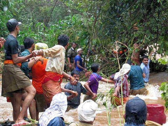 Stranded peoples are saved by rescuers