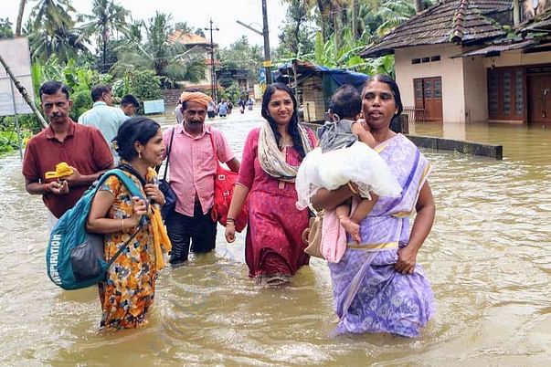People comes out from the houses to the relief camp