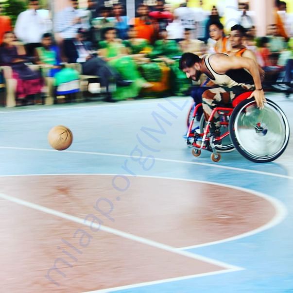 Javed chasing a ball at Paraplegic Rehabilitation Centre, Pune.
