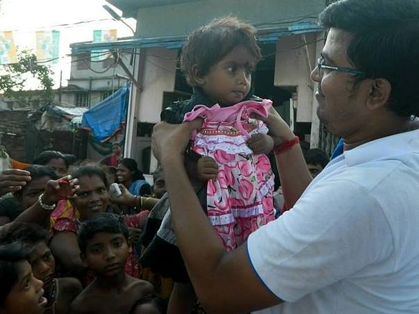 Clothes Distribution Among 4000 Needy Persons During Durga Puja