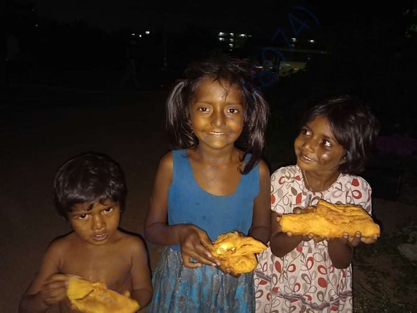 Serving food to the children