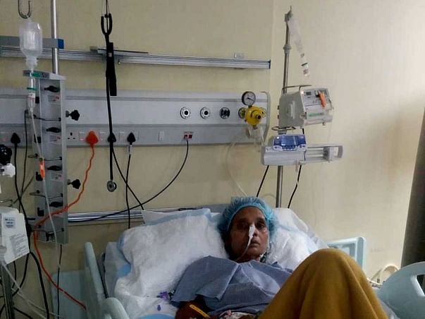 Help Meena Fight Cancer and Paralysis