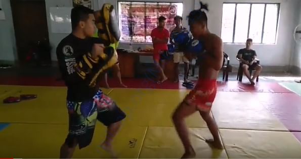 His padding during Muaythai and MMA seminar in Agartala