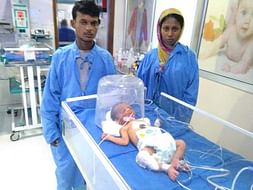 poor parents need help for their first new born child