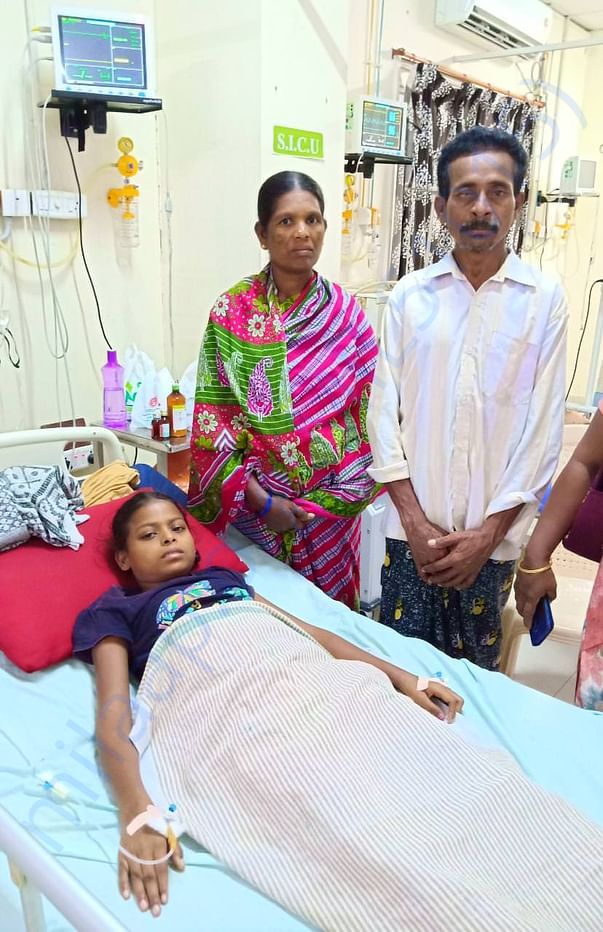 Affected child with her parents