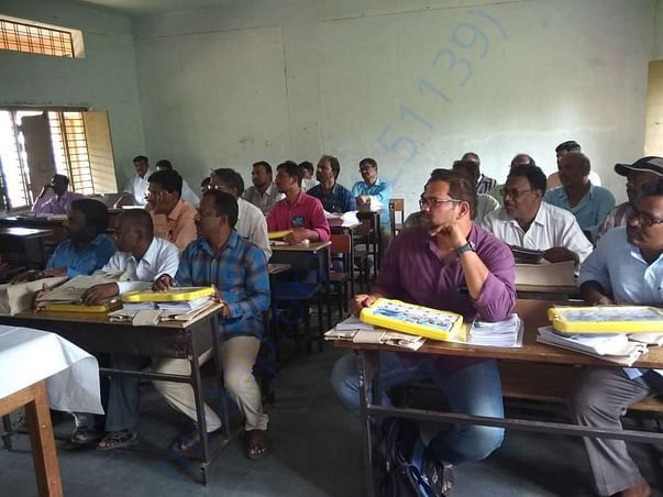 Group of teachers getting trained on effective use of technology