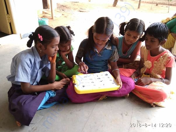 Group of students using the kit to learn and practice