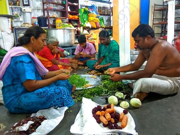 Sukumar and family packing the food packets