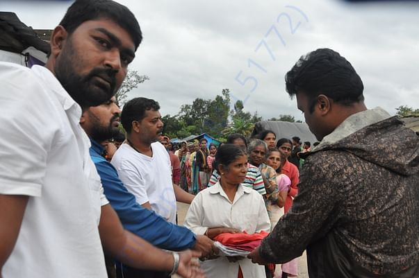 Distributing Releif Material during Kodagu floods