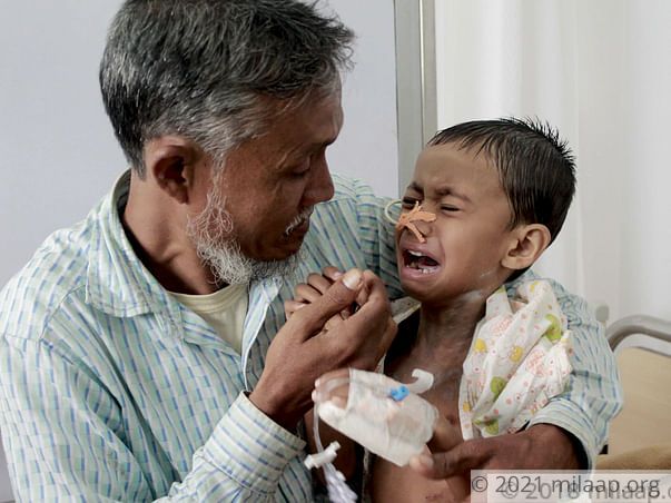 Miles away from home helpless father struggles to save son from cancer
