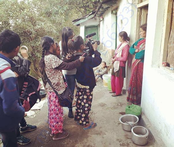 Children learning videography as part of project MVF Clicks