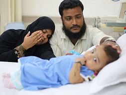 Poor parents struggle to raise funds for their son's treatment