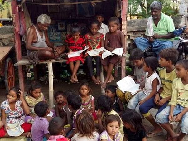 Helping the Poor Boy learn to read the Girls