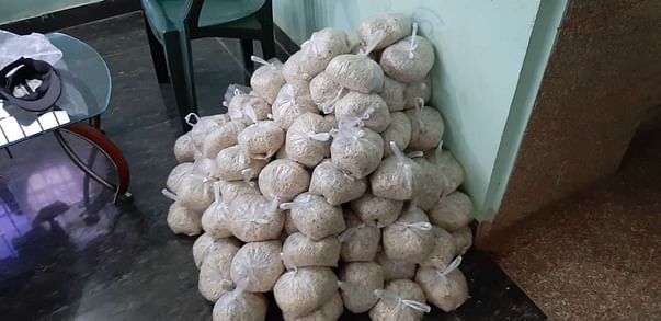 Packaging is going on for dry food for flood affected families