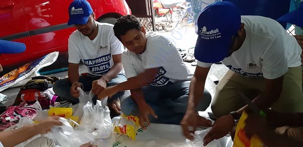 Packaging is going on for dry food for flood affected families